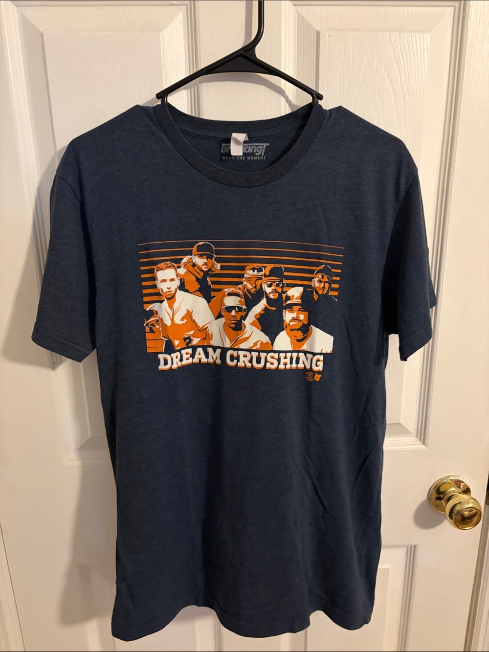 Navy Tee with Orange 'Dream Crushing' Graphic